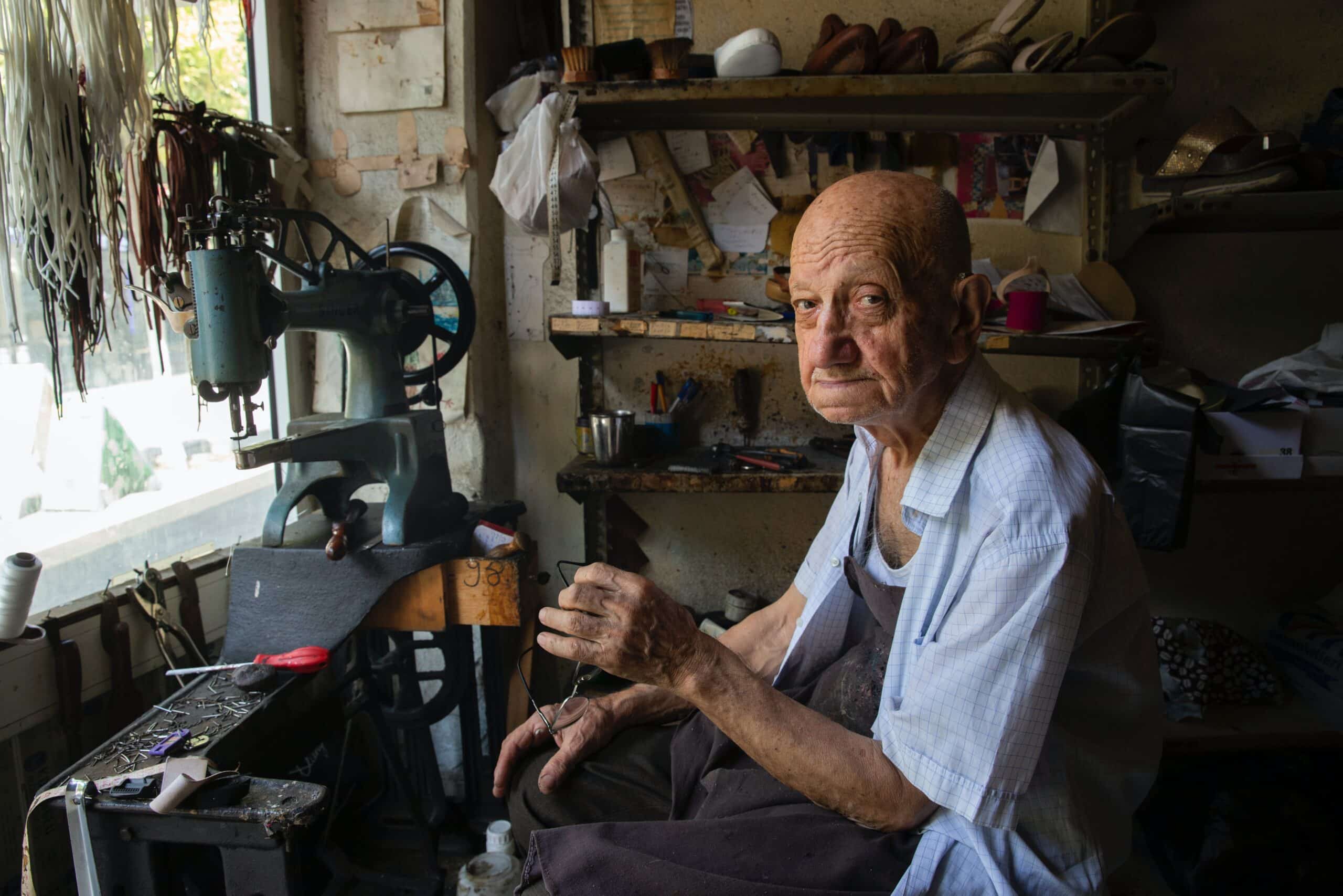 Elderly man working in his workshop in Perth